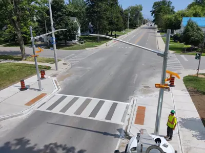 Overhead view of newly constructed sidewalk.