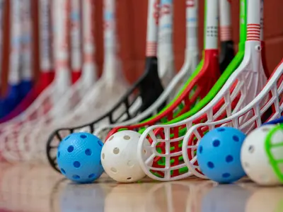 Floor hockey sticks and balls