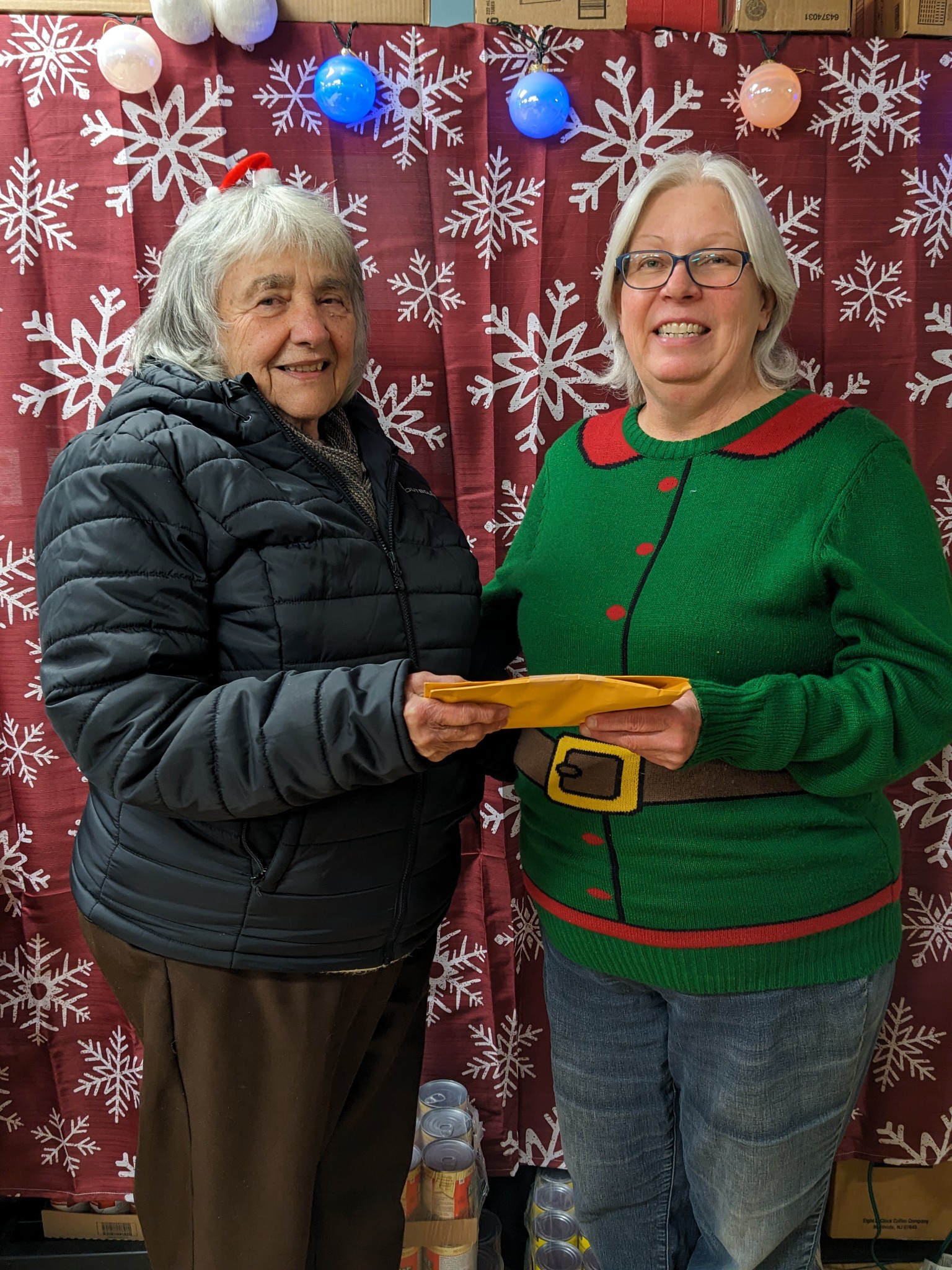 Ruth Brown and Dottie Smith pose for donation.